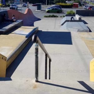 Varsity skate park hybrid section with rails, stairs and transitions